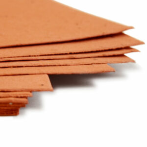 Plant this 11 x 17 Burnt Orange Plantable Seed Paper to grow wildflowers.